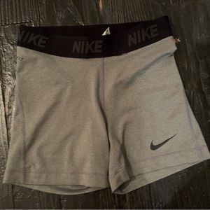 Grey and black Nike spandex shorts